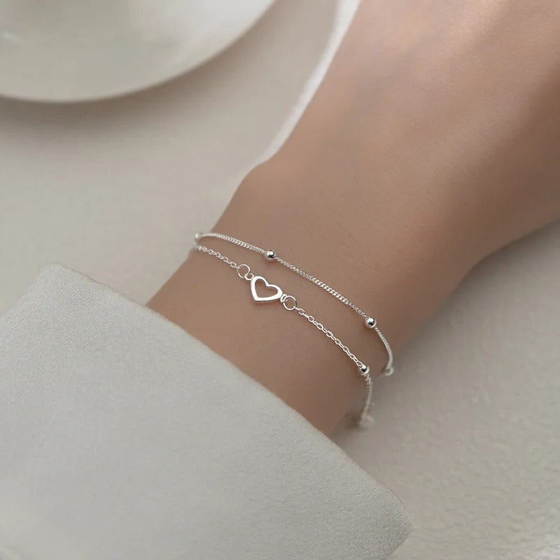 Pulsera fina de corazón de plata de ley 925
